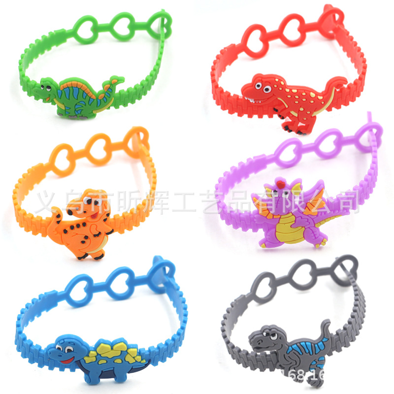 Cross-Border Factory Direct European and American three-hole adjustable dinosaur bracelet pvc cartoon wrist strap dinosaur children's bracelet
