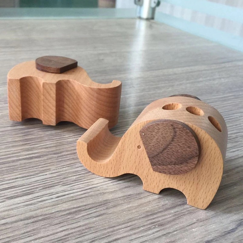Elephant pen holder creative mobile phone holder cute animal mobile phone holder wooden lazy mobile phone holder carved logo