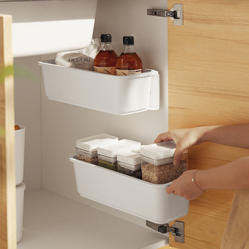 A corner kitchen rack pull-type storage box no punch storage box drawer sink rack
