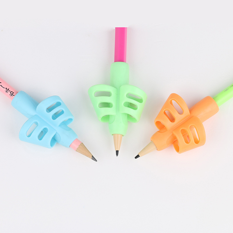 Hot sale toddler children correct writing posture corrector new strange student stationery gift two-finger pen grip wholesale