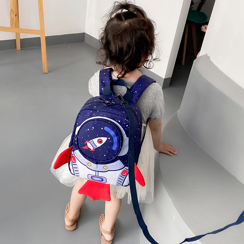 New Korean-Style Children's British Schoolbag with Anti-Lost Traction Rope, Kindergarten Backpack with Cartoon Rocket Design for Export