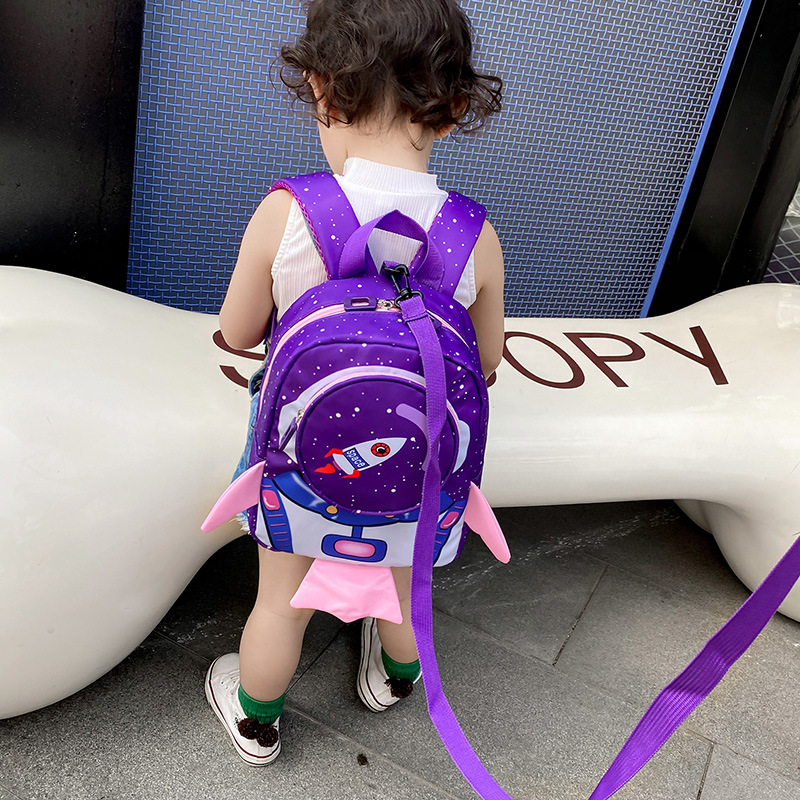 New Korean-Style Children's British Schoolbag with Anti-Lost Traction Rope, Kindergarten Backpack with Cartoon Rocket Design for Export