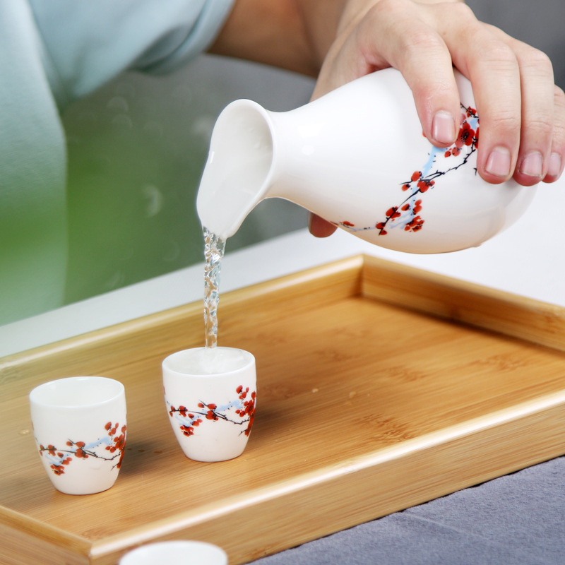 A pot of eight cups gift box penguin burning wine pot wine cup red golden dragon wine suit 9 ceramic wine dispenser