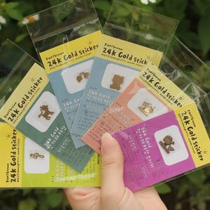 Factory direct creative stickers 24k gold-plated cartoon mobile phone small gift button stickers a generation of hair