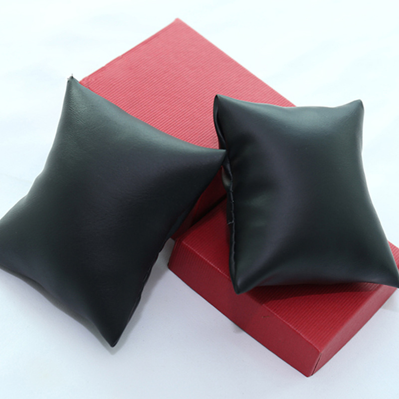 In stock wholesale pu thick leather pillow watch box universal pillow bracelet pillow bag silk cotton bag