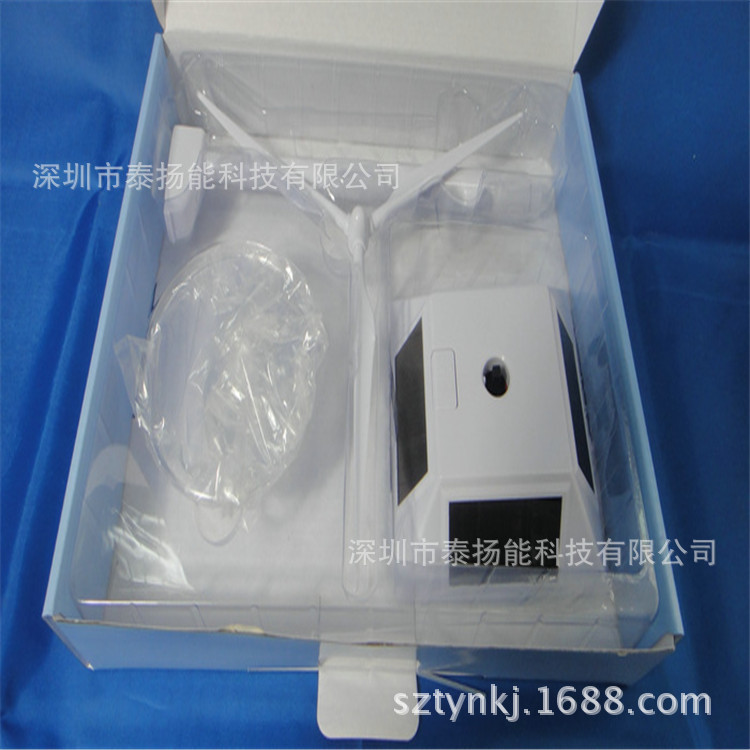 Solar windmill: indoor rotating windmill uses amorphous silicon solar panels as power