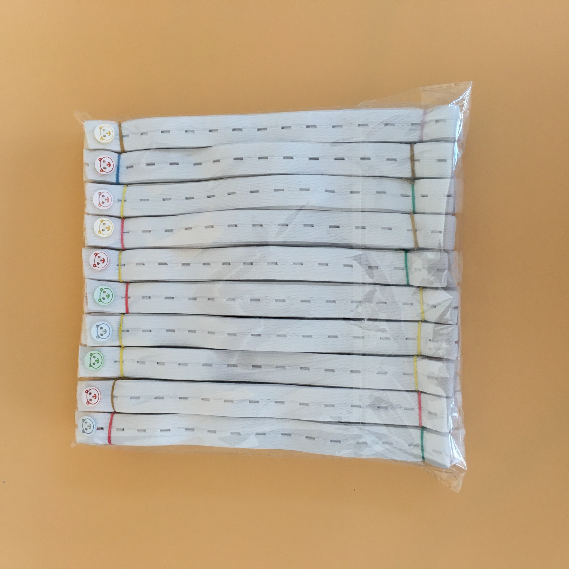 Factory wholesale baby diaper buckle baby diaper fixing belt binding diaper adjustable elastic band buttonhole belt