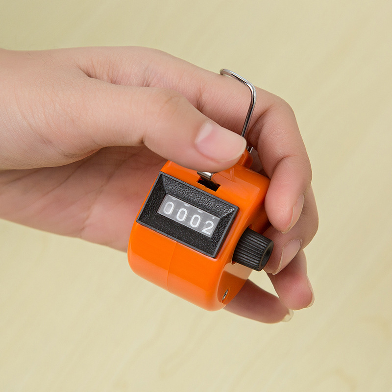 Colorful Plastic Manipulator Presses Four-Digit Counter to Count Students' Movements