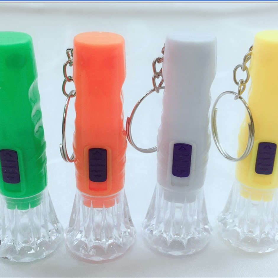 Factory direct 831 plastic fan strong light small flashlight wholesale LED outdoor keychain carrying creative flashlight wholesale