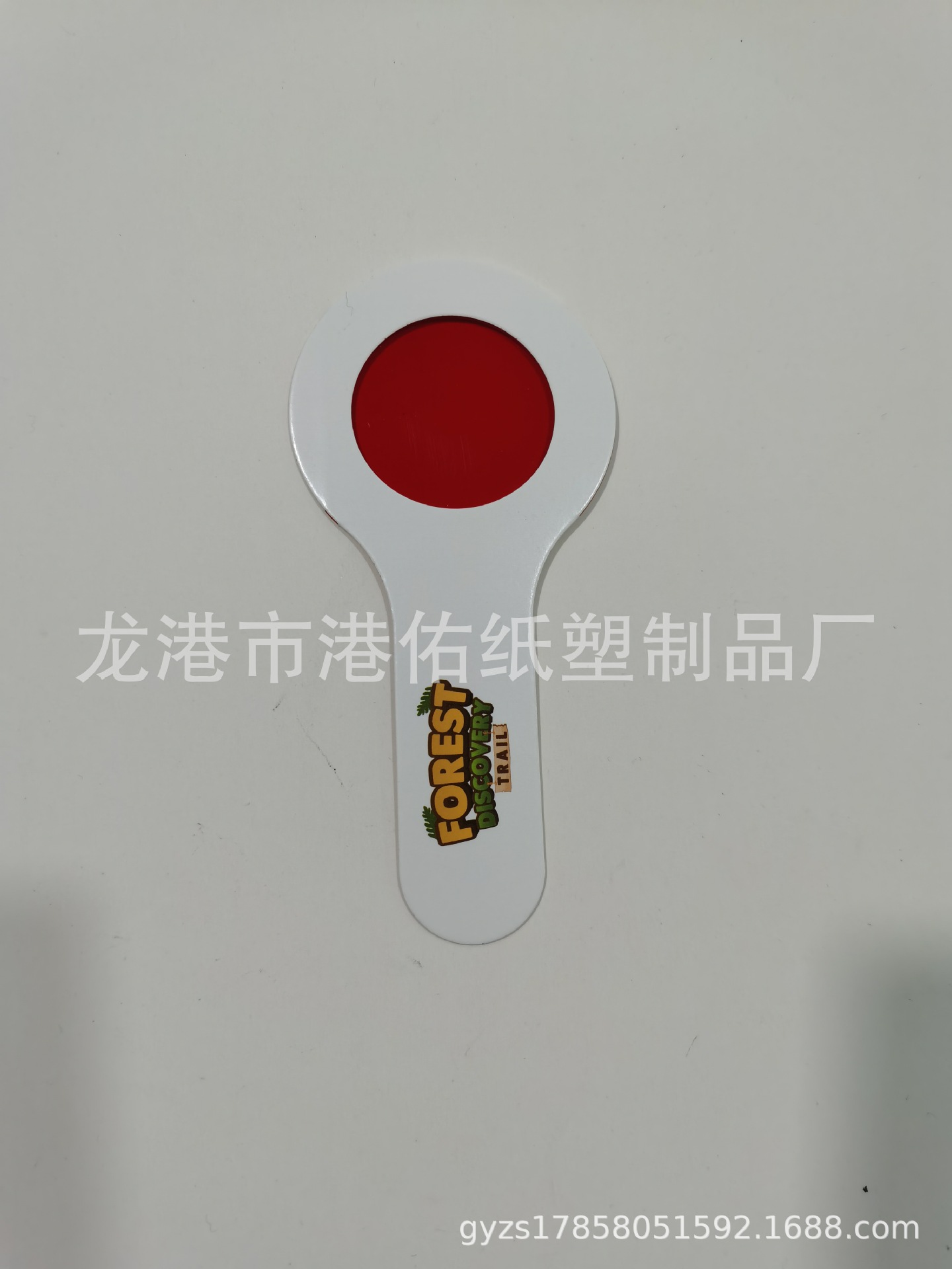 Hand-held decoding glasses red lens decoder