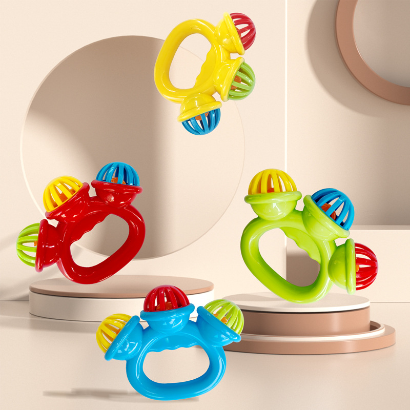 Cross-border hot selling infant pacifying rattle 0-3 years old ring hand shake three bell color baby hand grip rattle