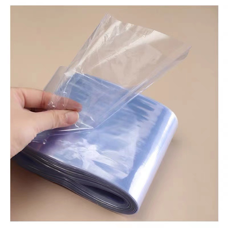 PVC transparent Heat Shrinkable film Tube film Two-end film Hot Air packaging film Heat Shrinkable film can be printed for one Jin free shipping