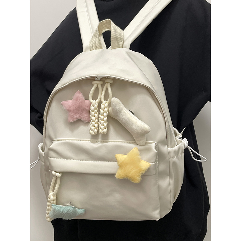 Schoolbag female middle school student college student simple all-match cute five-pointed star bone backpack female Fresh