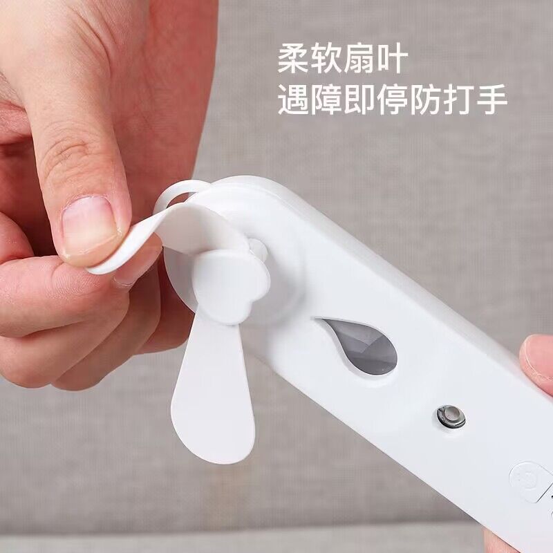 Nano spray water replenishing instrument fan two-in-one handheld convenient long endurance mute student outdoor mini fan