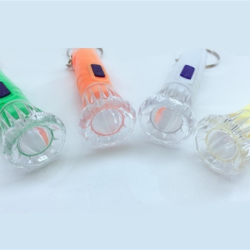 Factory direct 831 plastic fan strong light small flashlight wholesale LED outdoor keychain carrying creative flashlight wholesale