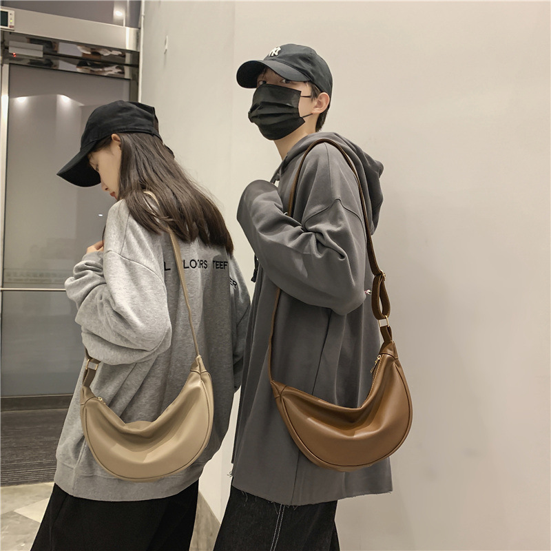 Korean ins bag mini messenger bag men and women design the same pu texture dumpling bag cos bag a generation of hair