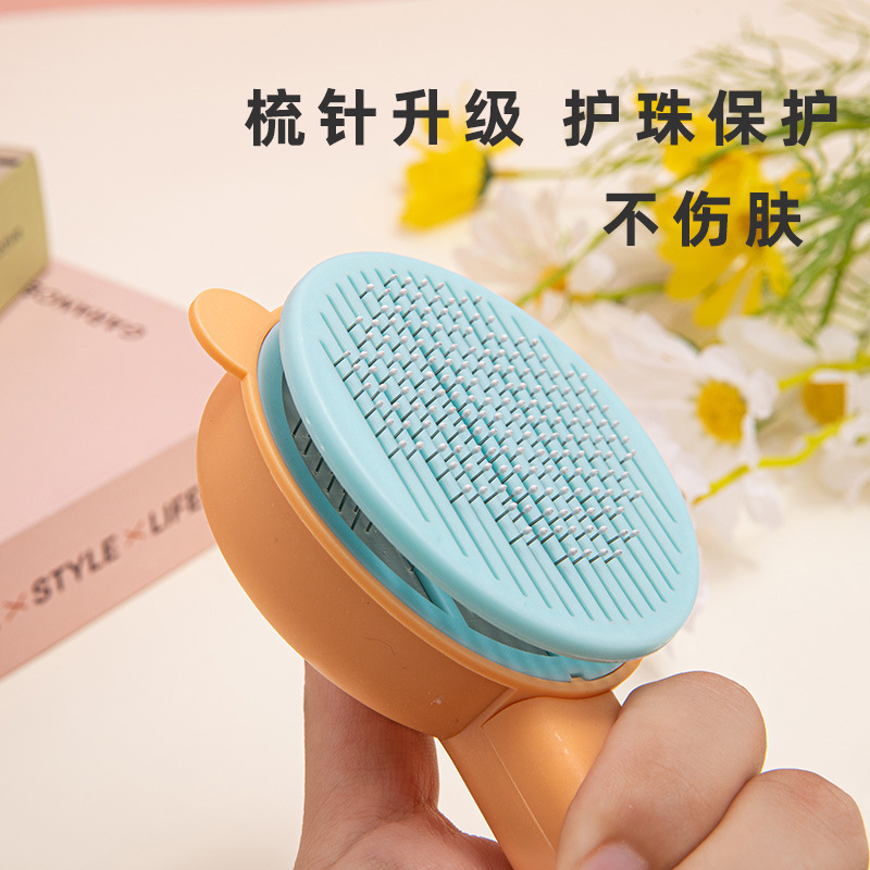 Pet supplies massage cat dog comb special floating hair comb cat ear bear head button cleaning floating hair cross-border hair removal