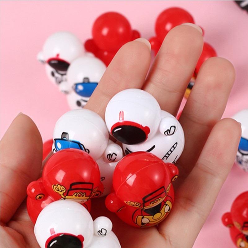 Cross-border exclusive mini tumbler casual nostalgic gift twist egg toy cartoon pattern desktop small swing