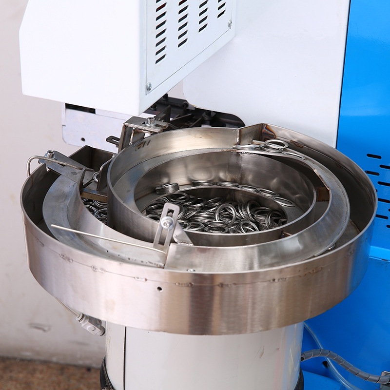 Full-automatic punching corns machine air-eye machine double-sided riveting machine punch-free four-button corns machinery and equipment