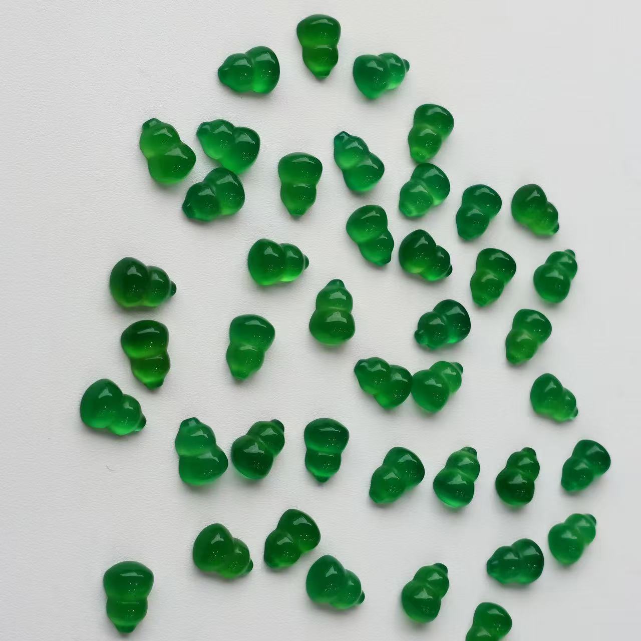 Natural green chalcedony flat bottom 7*9 gourd bracelet pendant bare stone carving craft accessories jewelry wholesale processing