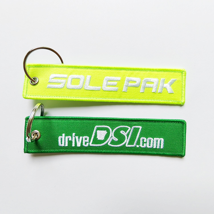 Customized Double-Sided Embroidered English Logo Fabric Strip Woven Embroidery Nylon Keychain Gift Box Bag Pendant Business Gift