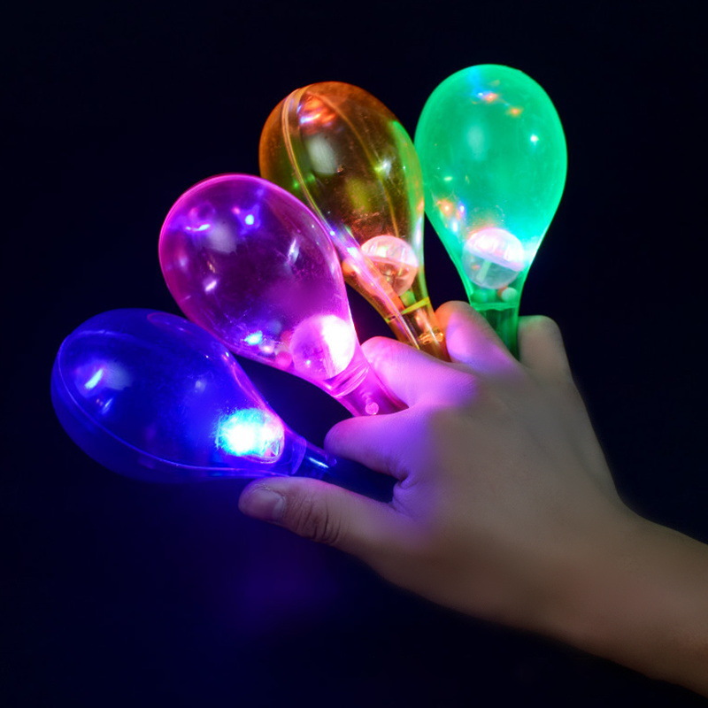 Factory wholesale a variety of transparent flash plastic sand hammer solid color plastic sand ball baby rattle toys can be printed logo