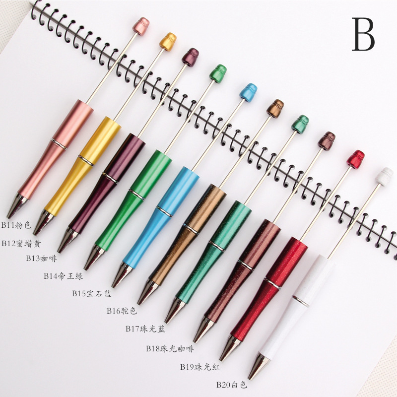 Beaded pen in stock wholesale diy creative cute grain beaded ballpoint pen UV plating beaded three color gradient beaded pen