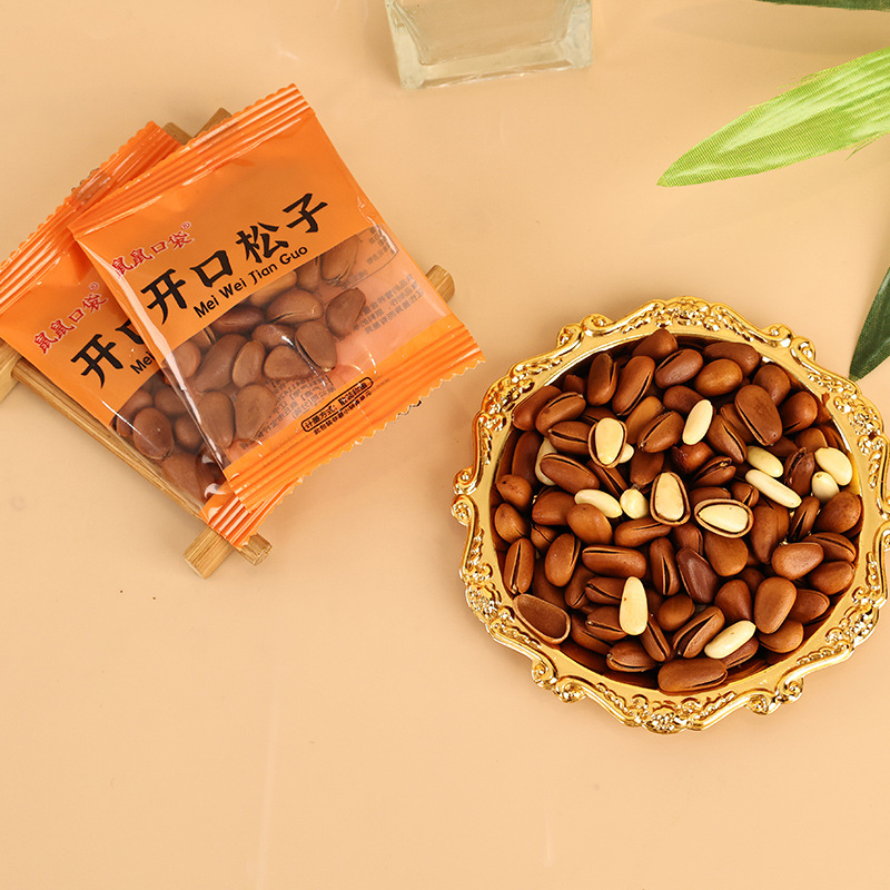 Large grain pine nuts fried open pine nuts children's leisure nuts snacks hand peeled pine nuts manufacturers wholesale