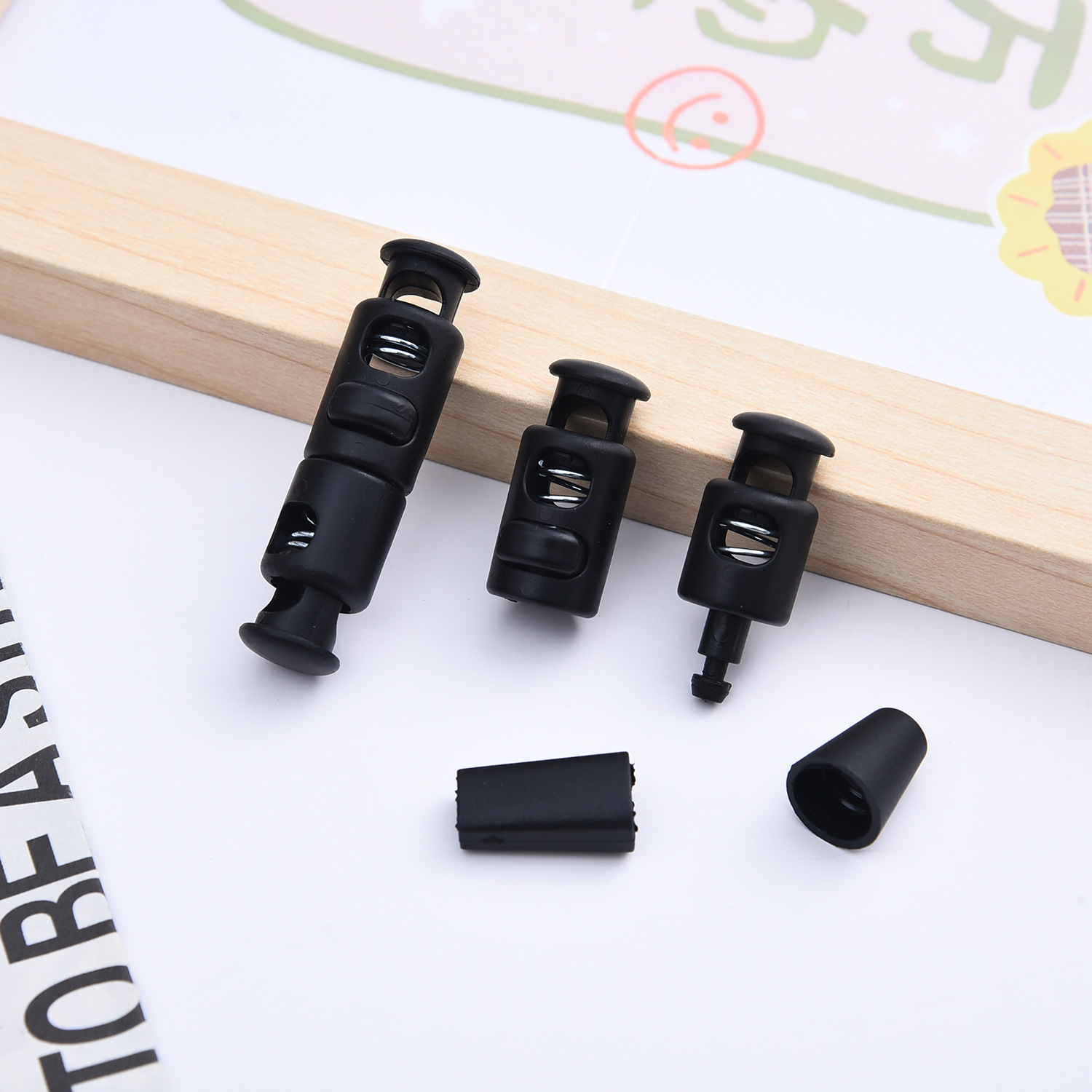 Оптовая продажа пластиковых пряжек для веревок, черные и белые