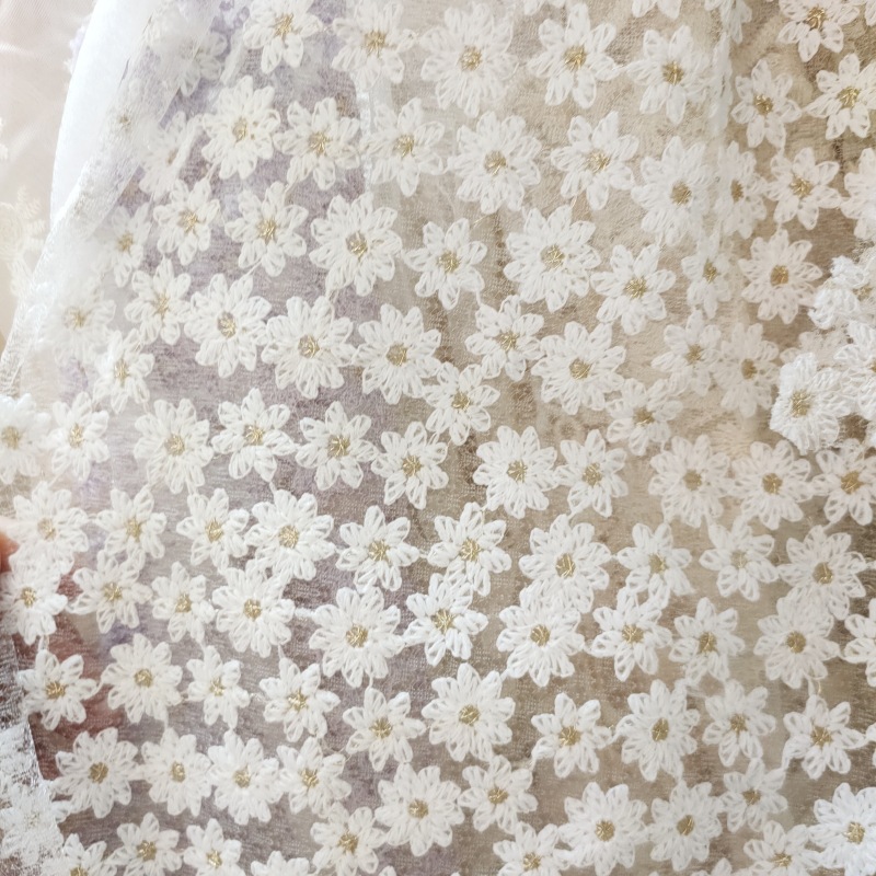 Milk silk small chrysanthemum gold thread water soluble embroidered fabric mesh lace wedding gift bag dance shoes hat fabric wholesale