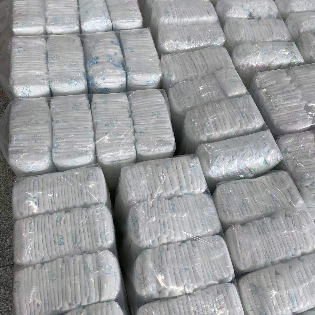 Composite film ring waist pants cheap large amount of discount children diapers baby diapers transparent bag