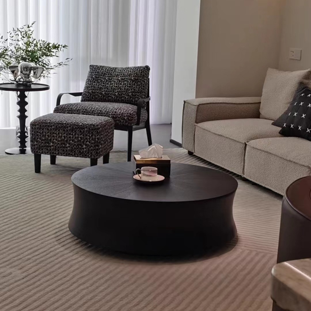 Modern simple household round tea table, simple design small apartment black tea table.