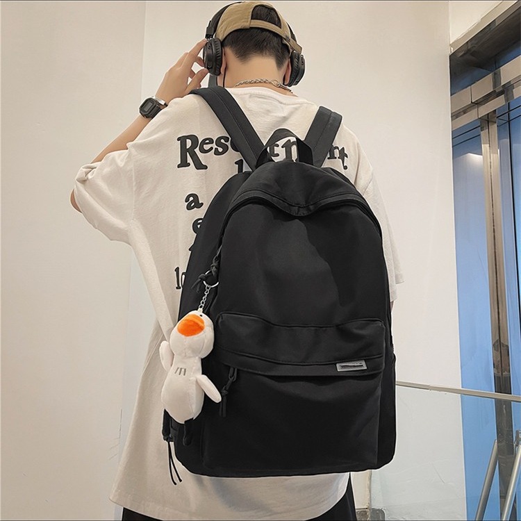 Backpack men's simple large capacity travel backpack women's casual Japanese junior high school student schoolbag men
