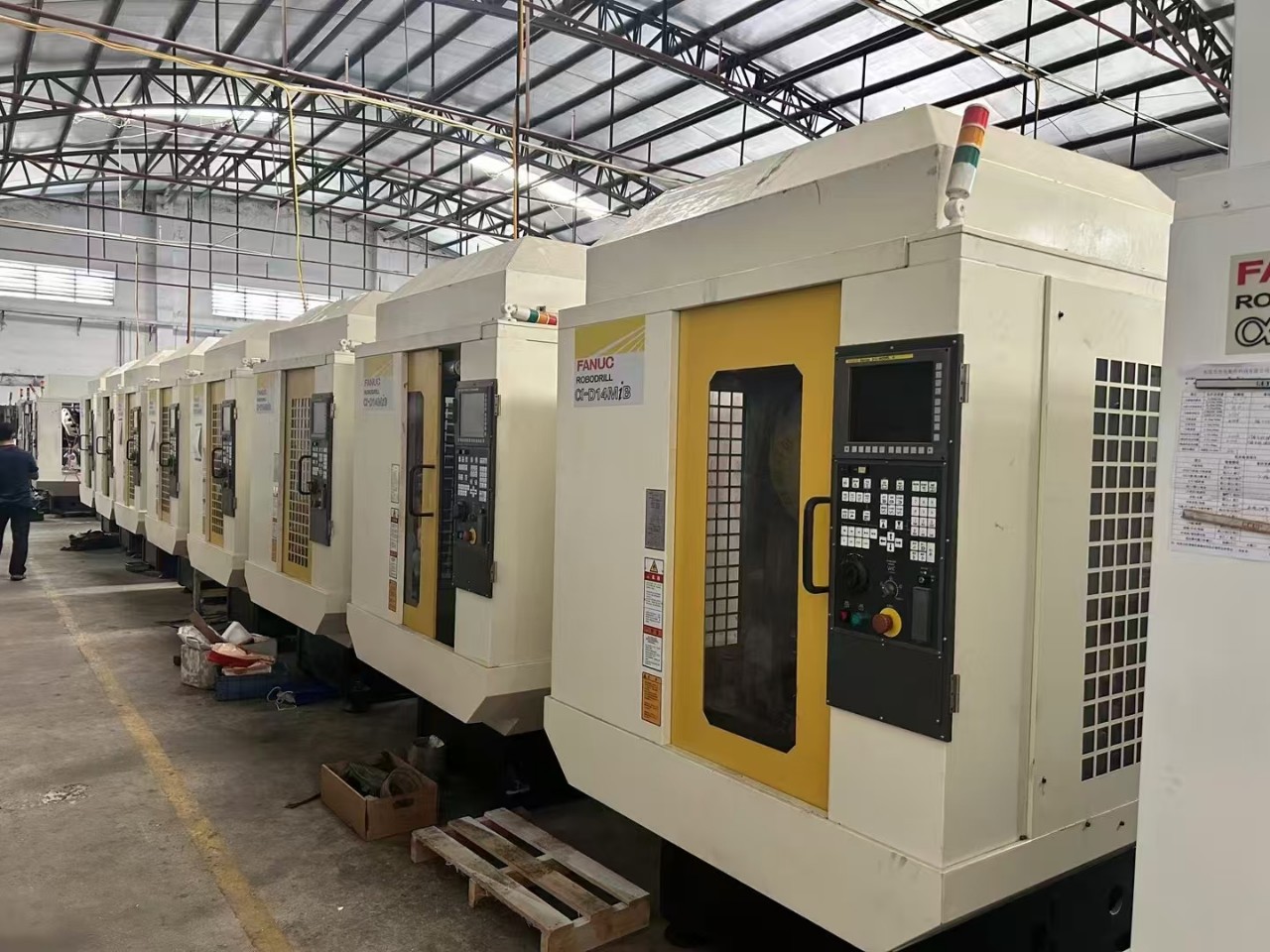 Brand: Fanuc Small Yellow Machine System: 31I-Model a Tool Magazine: 14 Servo Tool Magazines