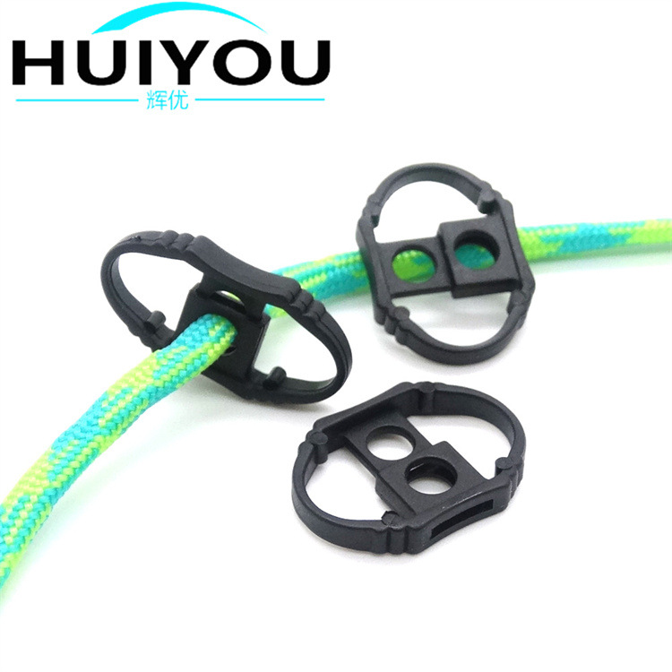 Manufacturers supply elastic dislocation double hole rope clip plastic durable spring rope buckle clothing accessories adjustment buckle
