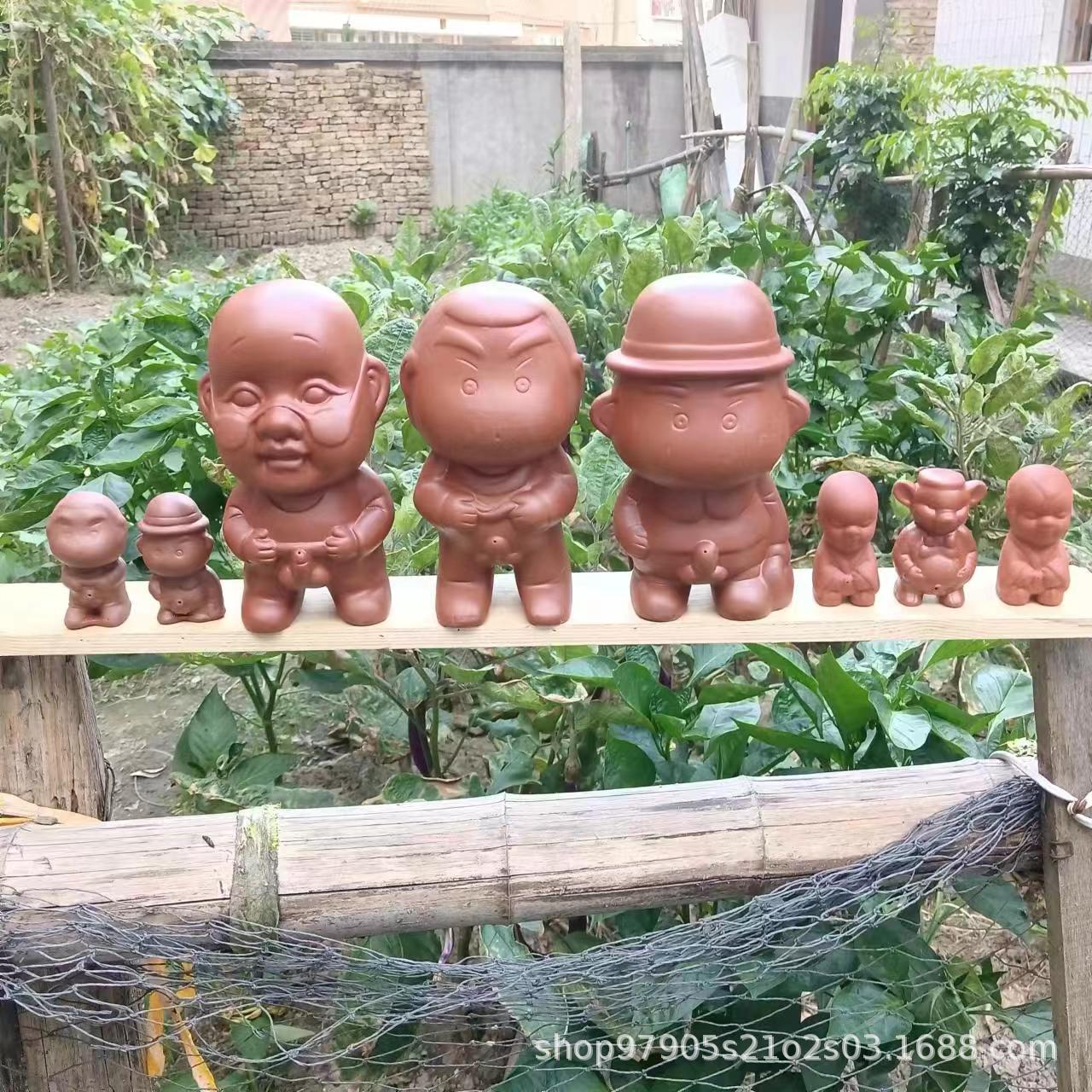 Purple sand tea pet decoration urine little monk water spray children urine doll wholesale tea ceremony parts wholesale gifts