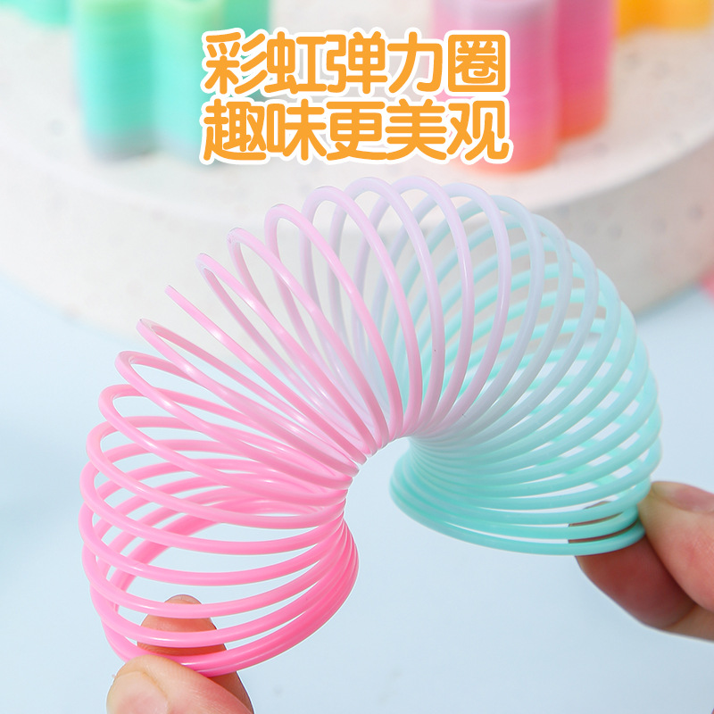 Factory Direct Sales small size magic rainbow circle student educational toys mini shaped spring ring night market stall supply