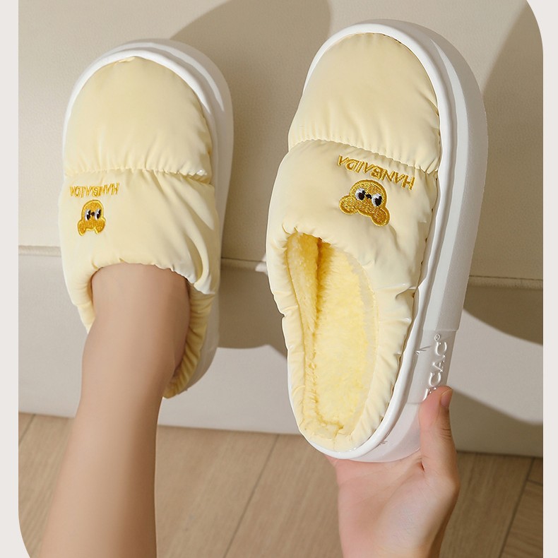 Down cloth waterproof cotton slippers women's new home mute thick-soled winter couples cotton slippers men wholesale outro