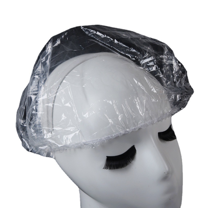 Spot disposable PE shower cap earmuffs plastic transparent thick high pressure bar shower cap bathroom hotel shower cap