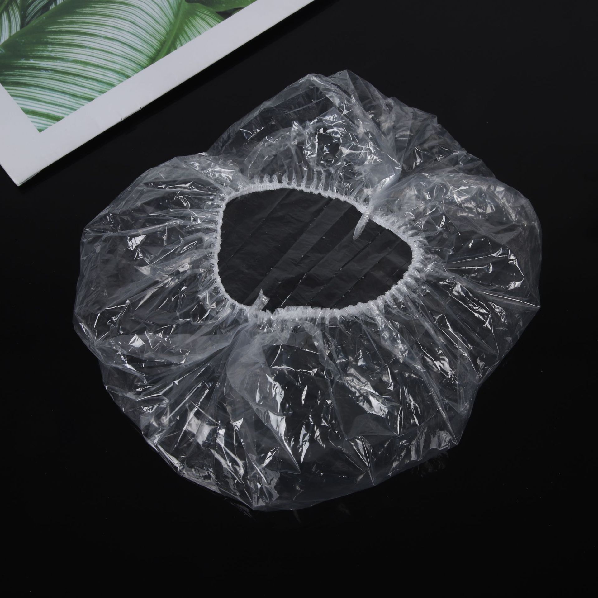 Spot disposable PE shower cap earmuffs plastic transparent thick high pressure bar shower cap bathroom hotel shower cap