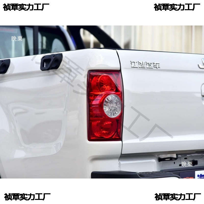 The Great Wall Is Equipped with a Pickup Truck Shuailing T68 with a Rear Cargo Box and a Guardrail Outside