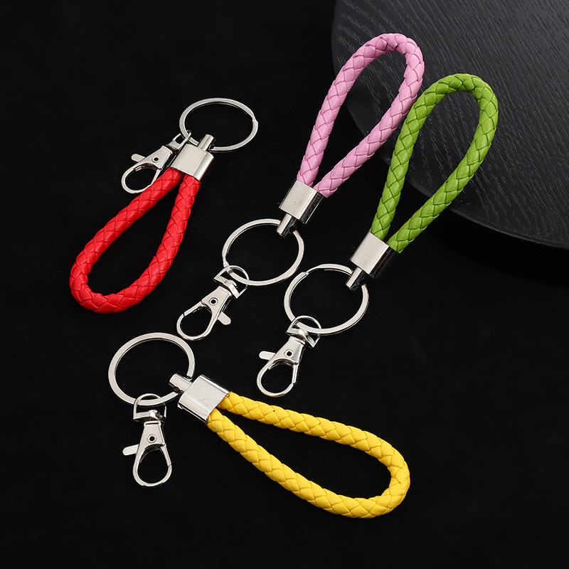 Spot wholesale woven leather rope keychain men's and women's DIY handmade car key accessories metal ring pendant decoration