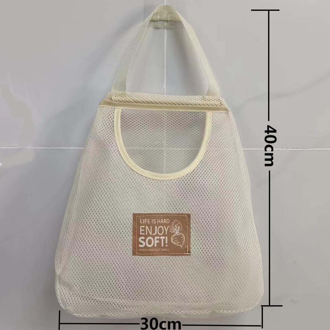 Home wall-mounted creamy-white storage hanging bag for ginger, garlic and onion hollow breathable storage bag wholesale