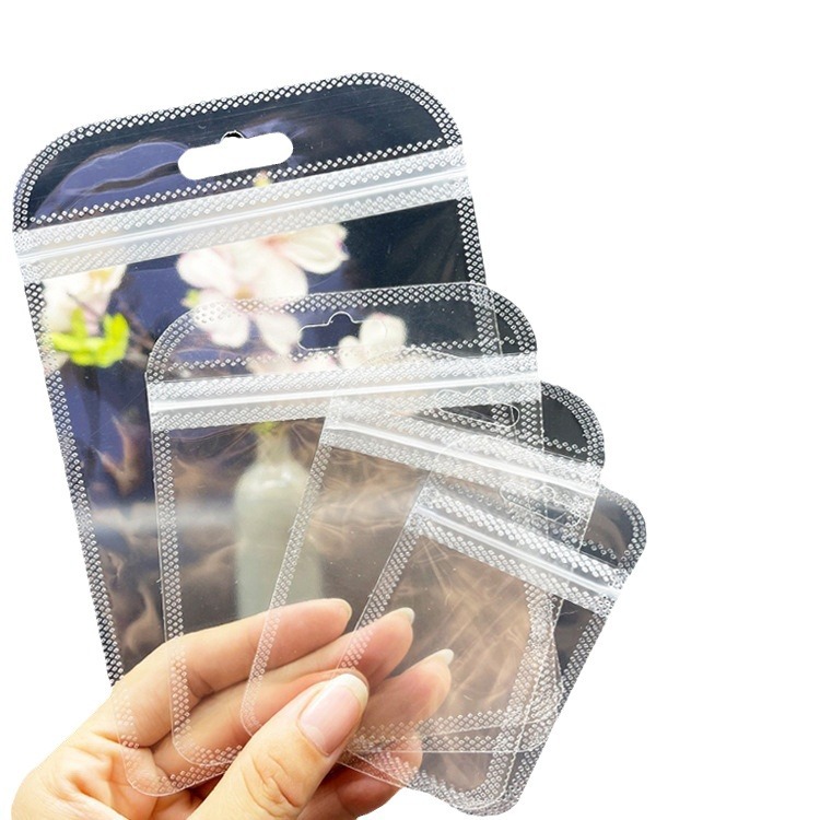 Chengxing manufacturers transparent plastic self-sealing bag jewelry packaging bag earrings sealing bag nail art small jewelry Yin and Yang bone bag