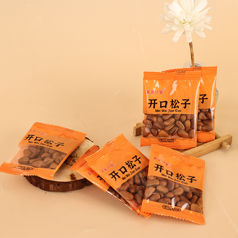 Large grain pine nuts fried open pine nuts children's leisure nuts snacks hand peeled pine nuts manufacturers wholesale