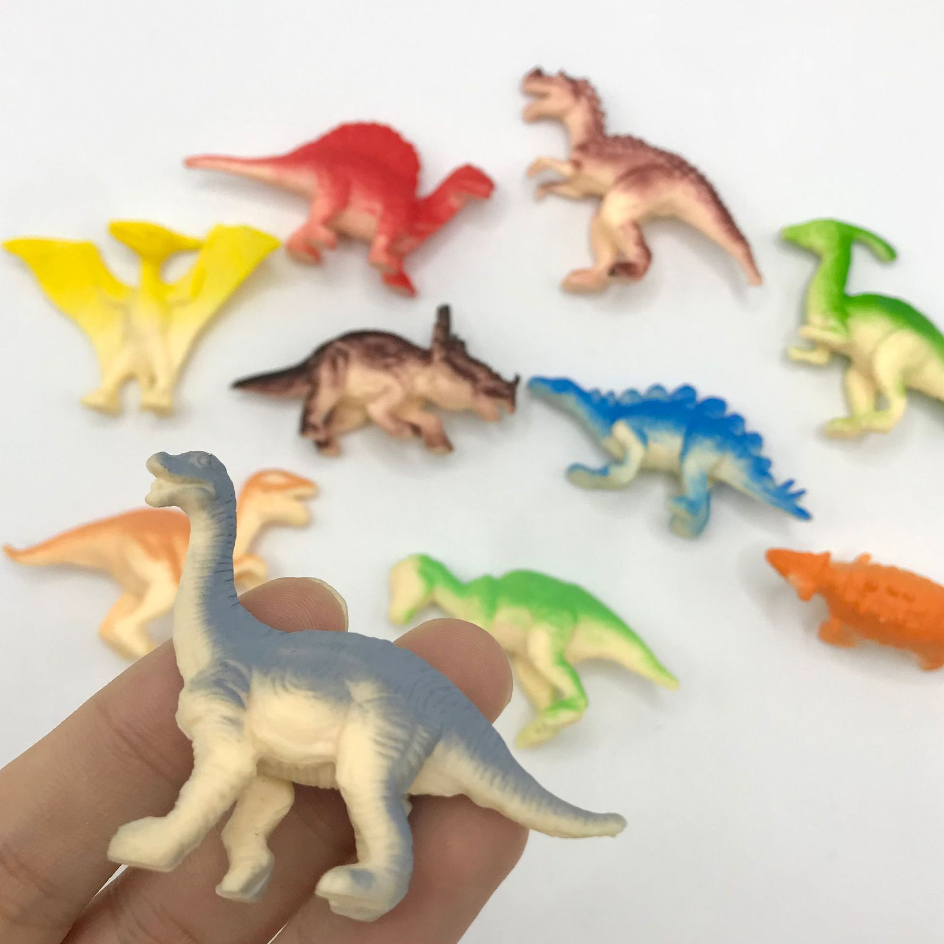 Simulation little dinosaur model 2-inch dinosaur toy pvc Jurassic dinosaur triangle dragon xunraptor kindergarten gift