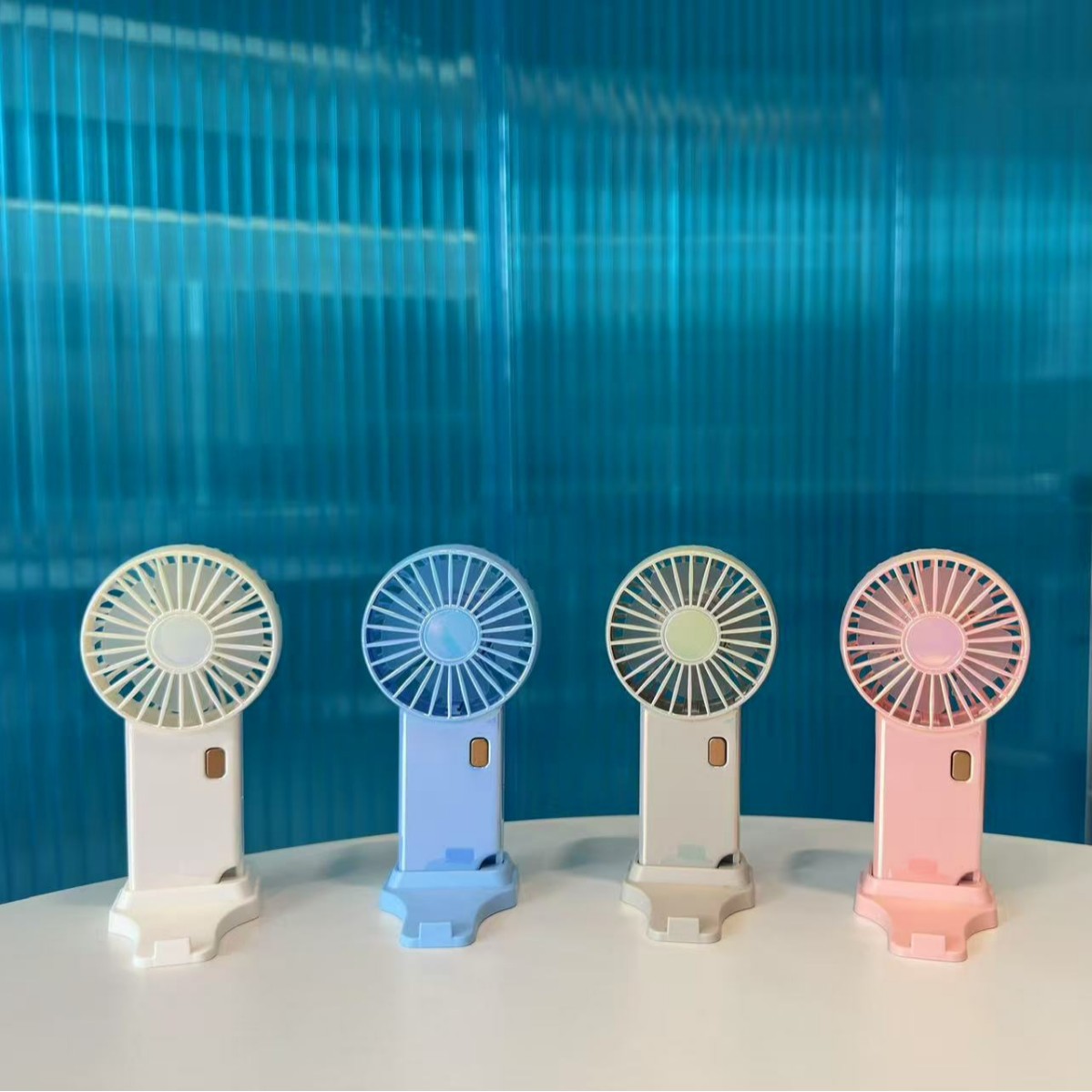 2025 новый ручной маленький вентилятор с мини перезаряжаемой подставкой для мобильного телефона кросс-бордерный подарок с логотипом