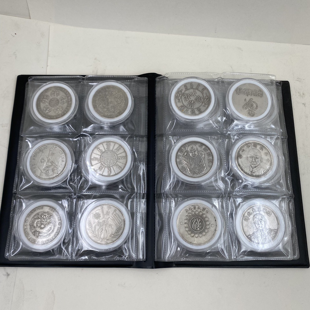 A Set of Anti-Ancient Coins, a Set of 36 Silver Dollar Collections, a Complete Set of Commemorative Coins, a Collection of Grade Coins, a Set of Brass Collection Books