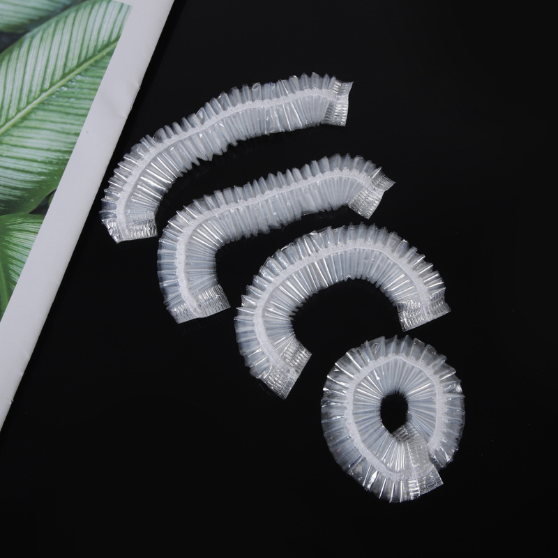 Spot disposable PE shower cap earmuffs plastic transparent thick high pressure bar shower cap bathroom hotel shower cap