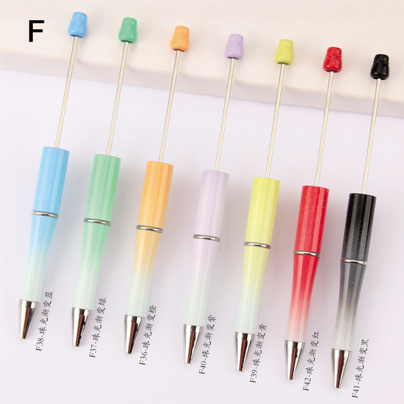 Beaded pen in stock wholesale diy creative cute grain beaded ballpoint pen UV plating beaded three color gradient beaded pen